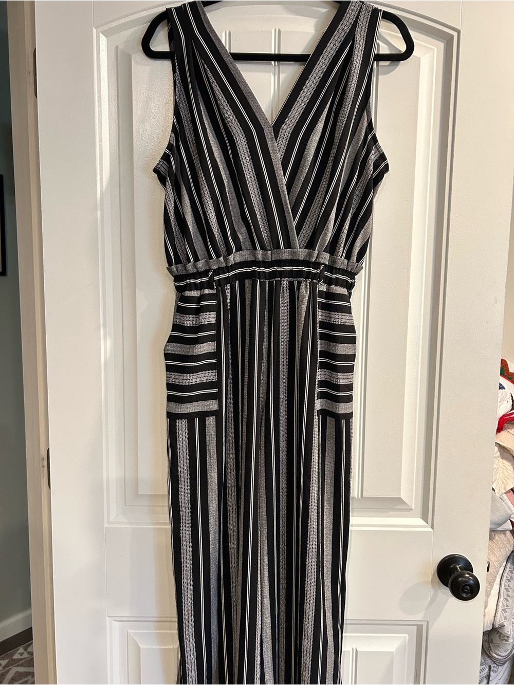 Monteau Black and White Striped V-Neck body suit/Romper.